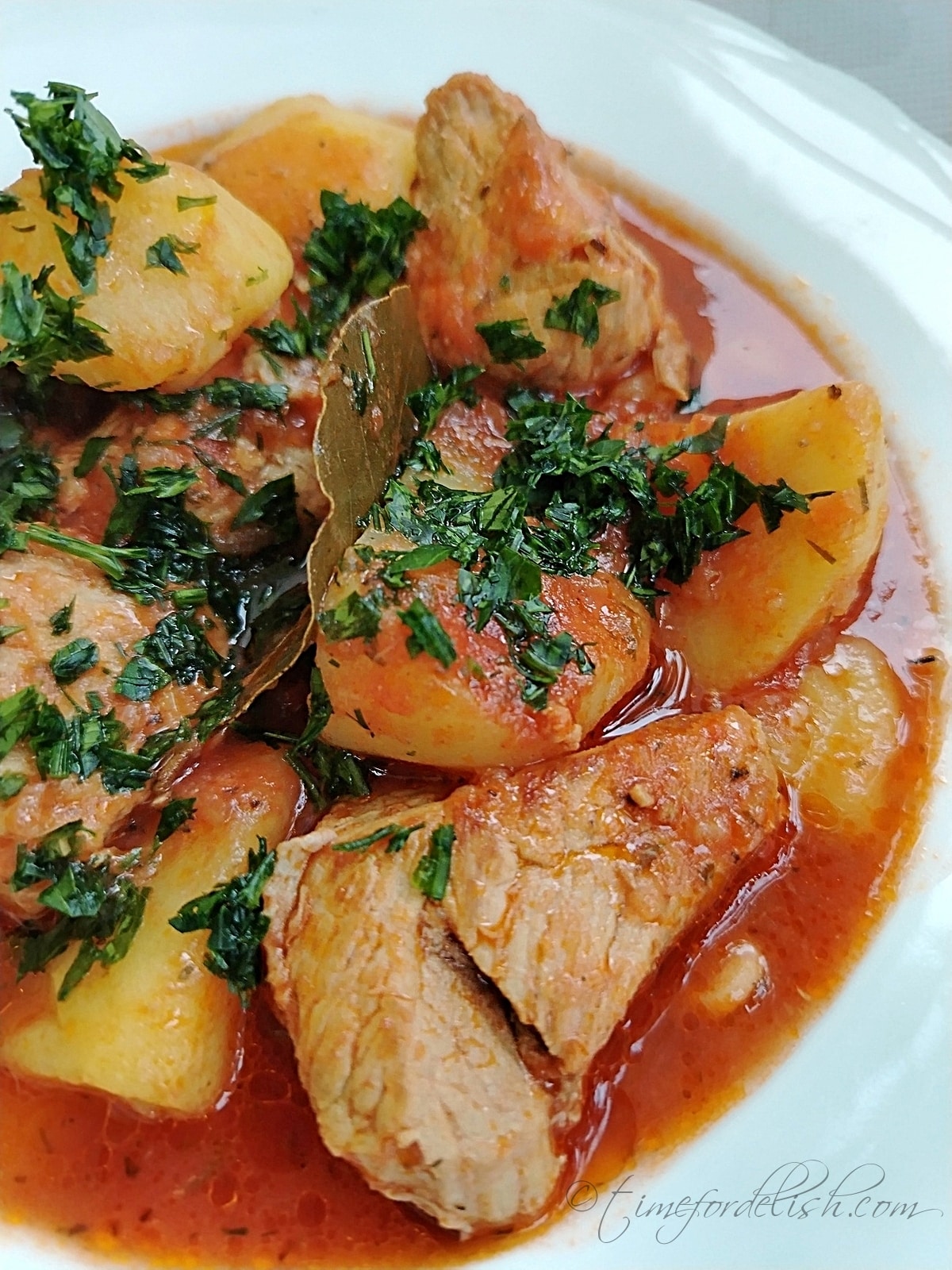 pork potato stew on a platter